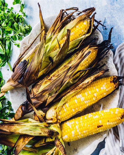 how long to cook sweet corn on the grill in the husk